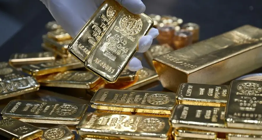 Gold rises on Trump's latest tariffs, firmer dollar caps gains
